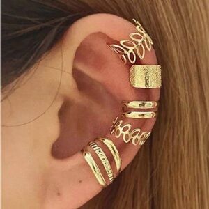 Stacked gold ear cuffs
